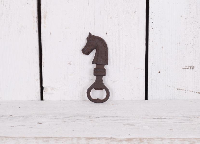 Hand held bottle opener with horse decoration