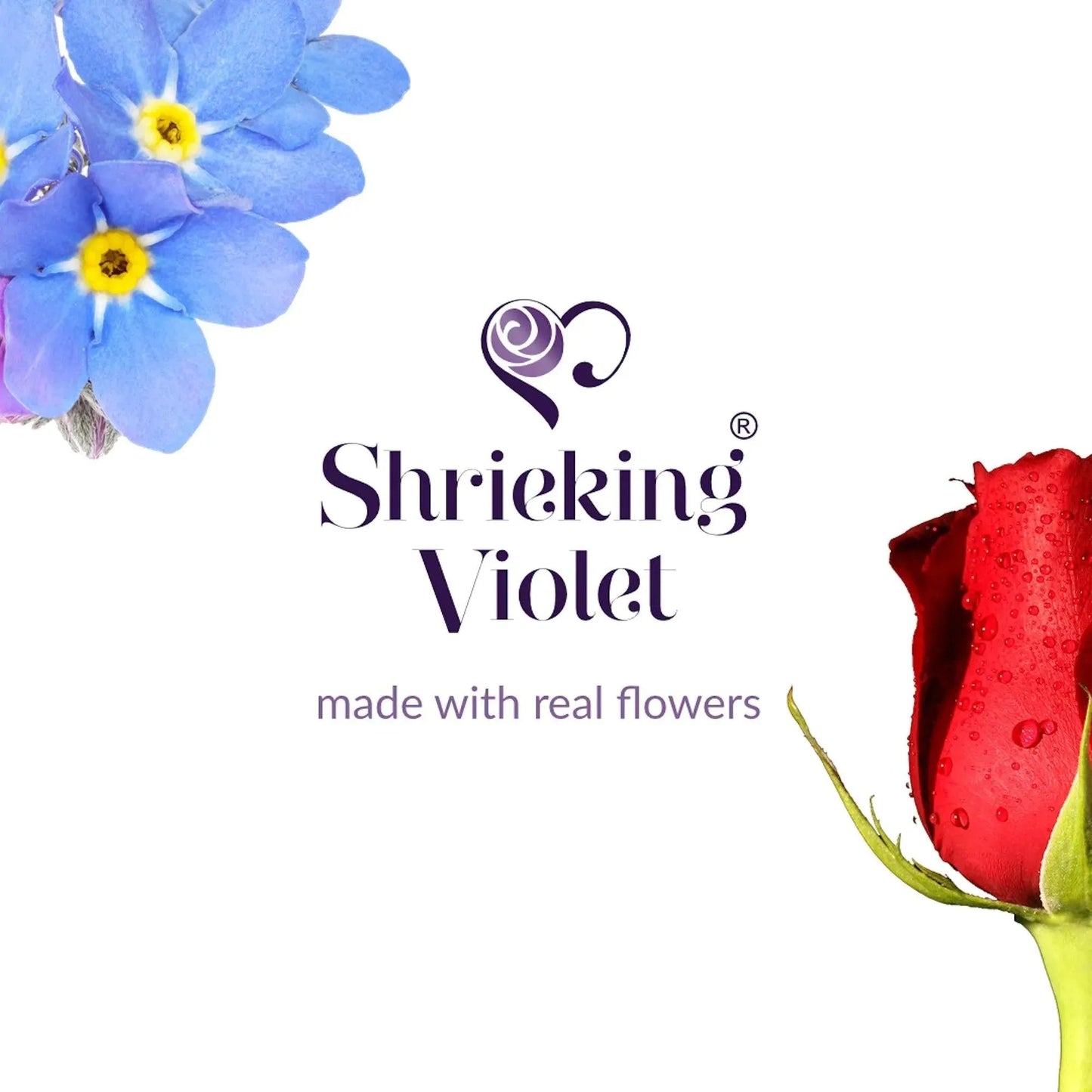 Sterling silver teardrop dangle earrings handmade with real flowers. Natural floral jewellery by  Shrieking Violet®